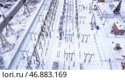 Top view of small electrical substation with rows of transformers in suburbs. Стоковое фото, фотограф David Kashakhi / Фотобанк Лори