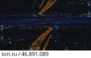 Moscow at night with urban architecture and river across the bridge, Russia, mirror horizon effect. Стоковое фото, фотограф David Kashakhi / Фотобанк Лори