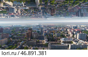 Aerial view over Moscow City districts in a summer sunny day, Russia, mirror horizon effect. Стоковое фото, фотограф David Kashakhi / Фотобанк Лори
