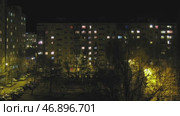 Light in windows of multistory buildings. Стоковое видео, видеограф Михаил Коханчиков / Фотобанк Лори