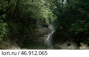 Mountainous cold stream flowing down the stony slope. Стоковое фото, фотограф David Kashakhi / Фотобанк Лори