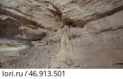 Beautiful walls of lighted cave with formations. Стоковое фото, фотограф David Kashakhi / Фотобанк Лори