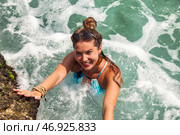 Feeling Refreshed in the Turquoise Waters of Sri Lanka With a Vibrant Smile and Sunlit Energy. Стоковое фото, фотограф Aleksandr Golubev / Фотобанк Лори