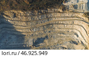 Top view of picturesque quarry located on coastal mountain near village in forest. Стоковое фото, фотограф David Kashakhi / Фотобанк Лори
