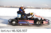 Kart racing on the frozen lake. Стоковое фото, фотограф David Kashakhi / Фотобанк Лори