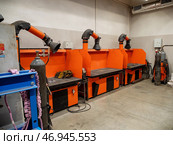 Металлообработка: сварочный пост на предприятии. Metalworking: welding post at the enterprise. Стоковое фото, фотограф Евгений Романов / Фотобанк Лори
