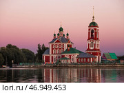 The Golden Ring of Russia, the city of Pereslavl-Zalessky. The Church of the Forty Martyrs of Sebaste at a beautiful pink sunset on the side of Lake Pleshcheyev. Стоковое фото, фотограф Photojuli / Фотобанк Лори