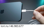 Flagship in world of iPhones with new Type C charging connector in model 15 pro (2023 год). Редакционное фото, фотограф David Kashakhi / Фотобанк Лори