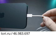 Flagship in world of iPhones with new Type C charging connector in model 15 pro (2023 год). Редакционное фото, фотограф David Kashakhi / Фотобанк Лори