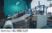Machines winding thermoplastic meshes made of polymers. Стоковое фото, фотограф David Kashakhi / Фотобанк Лори