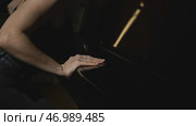 Elegant woman plays piano in accelerated rhythm. Стоковое фото, фотограф David Kashakhi / Фотобанк Лори