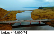 Rural landscape with golden agricultural fields around and the sea shore. Стоковое фото, фотограф David Kashakhi / Фотобанк Лори