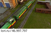 Aerial view of old trams parking on railways station with rust. Стоковое фото, фотограф David Kashakhi / Фотобанк Лори