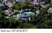 Orthodox Monastery, memorial complex of monasteries surrounded by trees. Стоковое фото, фотограф David Kashakhi / Фотобанк Лори