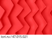 Увеличенный вид бумажных полосок на красном фоне. Стоковое фото, фотограф Pixel_shot / Фотобанк Лори
