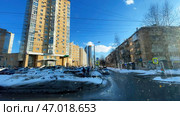 View of a city through the driving car window, time lapse. Стоковое фото, фотограф David Kashakhi / Фотобанк Лори