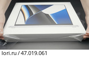 China, Beijing - April 22, 2023: Close-up of new laptop model. Редакционное фото, фотограф David Kashakhi / Фотобанк Лори