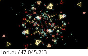 Abstract background of numerous multicolored neon triangles floating on a black. Стоковая иллюстрация, иллюстратор David Kashakhi / Фотобанк Лори