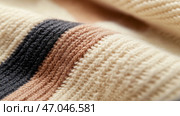 Soft textile featuring striped patterns in muted colors, showcasing intricate knit details and textures perfect for cozy interiors. Стоковое AI-изображение, AI-художник Сергей Толмачёв / Фотобанк Лори