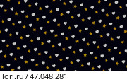 Beautiful cartoon animation of small stars and hearts moving up and down and rotating on the dark background. Стоковая иллюстрация, иллюстратор David Kashakhi / Фотобанк Лори