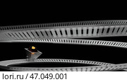 A wagon with crystal ball rolling fast back and forth isolated on a black background, concept of mining. Стоковая иллюстрация, иллюстратор David Kashakhi / Фотобанк Лори