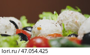 A colorful and refreshing Fresh Salad featuring Mozzarella and Olives for your enjoyment. Стоковое видео, видеограф Владимир Ковальчук / Фотобанк Лори
