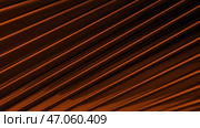 Diagonal 3d lines with metallic luster create background with texture. Стоковая иллюстрация, иллюстратор David Kashakhi / Фотобанк Лори