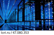 A video shows a futuristic data center with vibrant blue lights. Стоковое фото, фотограф David Kashakhi / Фотобанк Лори