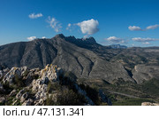 Горный массив Сьерра-де-Берния. Кальпе, Испания. Вид с горы Serra d'Oltà (2016 год). Стоковое фото, фотограф Дымов Игорь / Фотобанк Лори