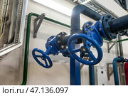 Industrial Valves and Piping in a Facility, Showcasing Modern Engineering and Design. Стоковое фото, фотограф Aleksandr Golubev / Фотобанк Лори