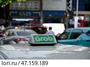 Такси аггрегатора Граб или Grab в Хошимине (Азия) Редакционное фото, фотограф Сергей Митрофанов / Фотобанк Лори
