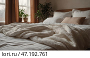 The interior of a modern house. A minimalistic cozy beige bedroom interior with a plaid, pillows, a headboard, linen linens and a bedside table. Стоковое AI-изображение, AI-художник Photojuli / Фотобанк Лори