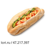 Вкусный хот-дог на белом фоне. Стоковое фото, фотограф Pixel_shot / Фотобанк Лори