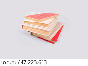 Stack of books isolated on a white background. Стоковое фото, фотограф Елена  Попкова / Фотобанк Лори
