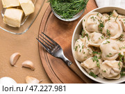 Чаша с вкусными варениками на столе. Стоковое фото, фотограф Pixel_shot / Фотобанк Лори