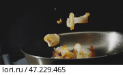 A Delicious Sizzling Shrimp Dish in a Skillet Presented Against a Dark Background. Стоковое видео, видеограф Владимир Ковальчук / Фотобанк Лори