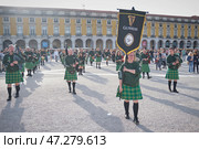 St. Patrick's day celebration parade - musicians in Irish kilts with bagpipes marching in the street (2024 год). Редакционное фото, фотограф Дмитрий Рухленко / Фотобанк Лори