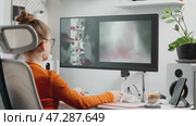 Modern workspace of young woman artist using AI to boost creativity. Synergy of technology and artistry results in innovative designs, showcasing potential of AI in creative workflows. Стоковое видео, видеограф Енваев Андрей / Фотобанк Лори