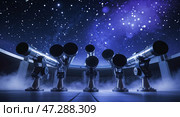 Stargazers gather around powerful telescopes under a starry night sky for celestial viewing in a modern observatory setting. Стоковое AI-изображение, AI-художник Сергей Толмачёв / Фотобанк Лори