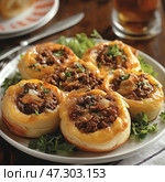 A dish made of puff pastry filled with meat filling. The portioned pies look delicious: a golden, crispy crust frames a juicy meat mixture of minced meat, onions and spices, and everything is sprinkled with fresh herbs on top. The dish is served on a white plate with a garnish of fresh herbs. The background emphasizes the homeliness - on the table you can see cutlery, a glass with a drink and a blurred plate with bread. The whole composition creates an atmosphere of a delicious, hearty home dinner. Стоковое AI-изображение, AI-художник Анна Кривицкая / Фотобанк Лори