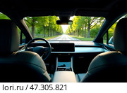 Interior of autonomous car. Driverless vehicle. Self driving. UGV. Advanced driver assistant system. Стоковое AI-изображение, AI-художник Ирина Старикова / Фотобанк Лори