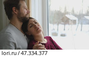 Mature couple hugging hugging each other kissing at home bedroom. Intimate Moment. Tender embrace shared between a loving middle age man and woman, husband and wife. Deep love. Low key, cinematic. Стоковое видео, видеограф Марина Демидюк / Фотобанк Лори