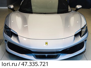 Ferrari Supercar Front Closeup Highlighting Aerodynamic Design. London, UK, 28 October 2023. Редакционное фото, фотограф Zydrius Tartenis / Фотобанк Лори
