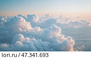 Bright and fluffy clouds above a serene sky during sunset in a peaceful atmosphere. Стоковое AI-изображение, AI-художник Сергей Толмачёв / Фотобанк Лори