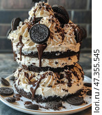 A luxurious three-tiered naked cake, decorated with chocolate Oreo-type cookies, whipped cream and thick chocolate sauce. Rich chocolate-colored layers alternate with lush layers of cream. The top and sides of the cake are decorated with whole and crumbled cookies, and viscous chocolate drips add an appetizing casualness. The dessert looks incredibly rich, caloric and tempting - perfect for those with a sweet tooth and a festive table. Стоковое AI-изображение, AI-художник Анна Кривицкая / Фотобанк Лори