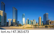 Abu Dhabi, United Arab Emirates - Jan 10 2024, Panoramic view of the square with the Al Musallah public space, built by the CEBRA, with skyscrapers in background, Abu Dhabi, United Arab Emirates. Редакционное фото, фотограф Сергей Богомяко / Фотобанк Лори