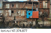 Dharavi slums in east Mumbai. Bandra District, Maharashtra, India. Стоковое фото, фотограф Mikhail Davidovich / Фотобанк Лори