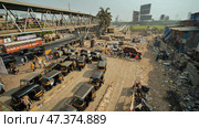 Mumbai, India - December 17, 2018 Dharavi slums in east Mumbai. Bandra District, Maharashtra, India. Редакционное фото, фотограф Mikhail Davidovich / Фотобанк Лори