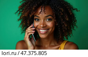 Smiling Woman Engages in a Cheerful Conversation on Her Phone Against a Vibrant Green Backdrop. Стоковое AI-изображение, AI-художник Sergey Grishin / Фотобанк Лори