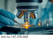 Endodontist conducting a detailed root canal treatment in a dental office. Эндодонтист использует точные инструменты под микроскопом, чтобы провести лечение корневого канала у пациента, обеспечивая бережное отношение к зубу в современном стоматологическом кабинете. Стоковое AI-изображение, AI-художник Katsiaryna Repich / Фотобанк Лори